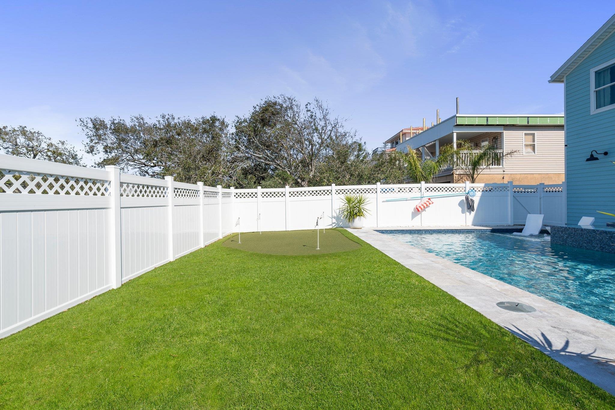 5497 Pelican Way St. Augustine, FL 32080 - Photo 45 of 49 a view of a backyard with swimming pool