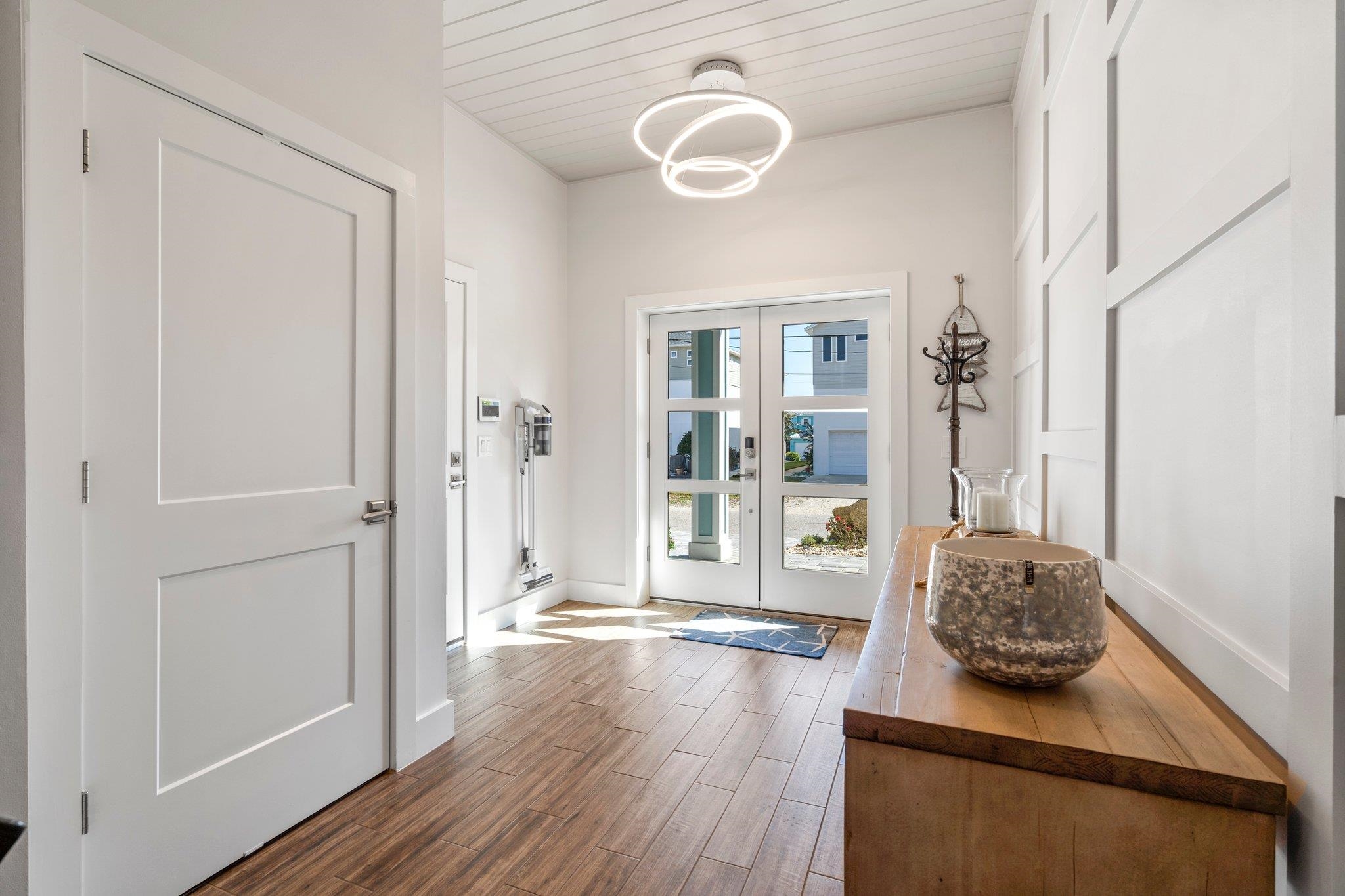 5497 Pelican Way St. Augustine, FL 32080 - Photo 9 of 49 a view of a livingroom with wooden floor and furniture