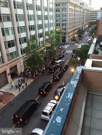 a view of a lobby with furniture and chandelier