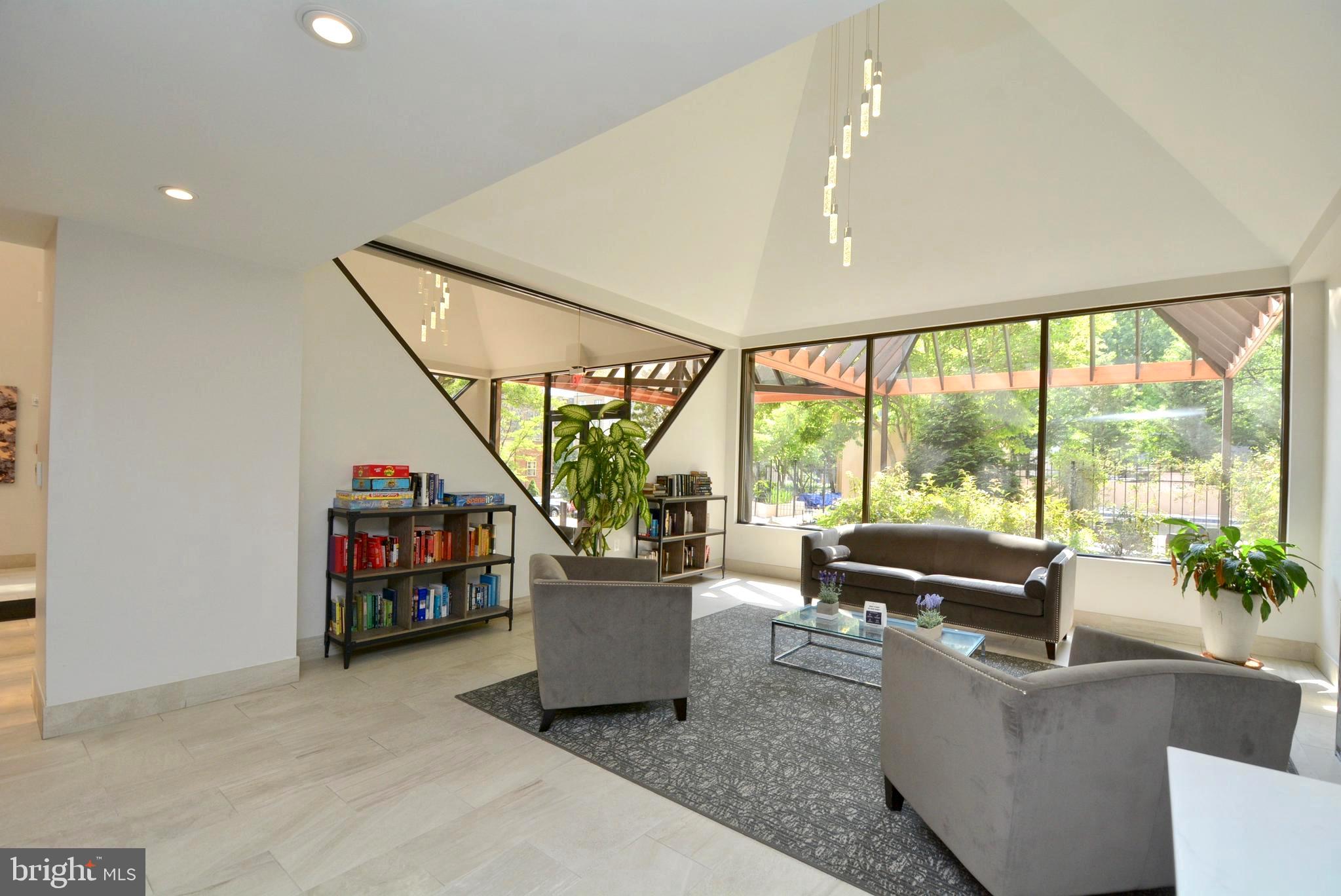 1301 North Courthouse Road, Unit 1512 Arlington, VA 22201 - Photo 7 of 37 Lobby overlooking the pool and garden