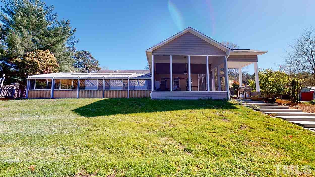 3111 Old Allensville Road Roxboro, NC 27574 - Photo 14 of 17 a view of a house with a swimming pool