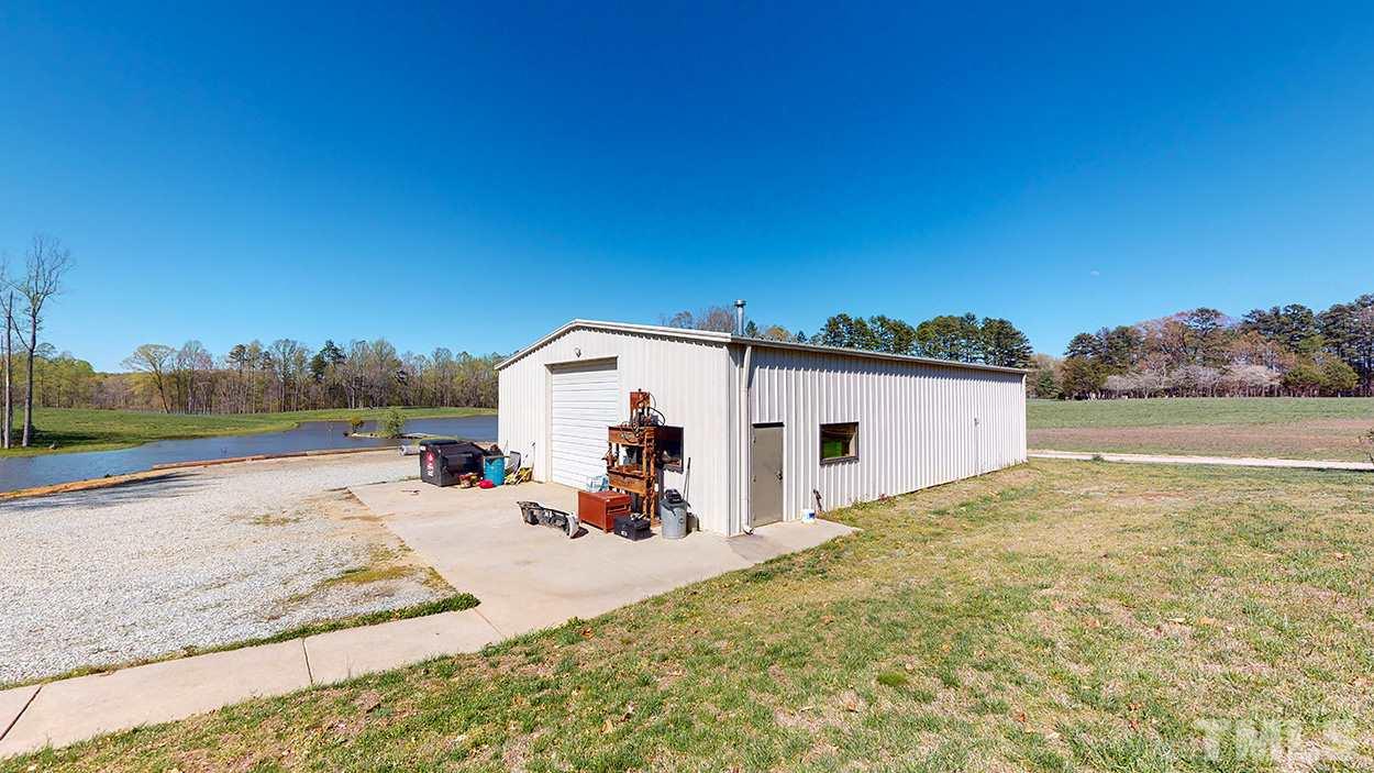 3111 Old Allensville Road Roxboro, NC 27574 - Photo 17 of 17 a view of a backyard