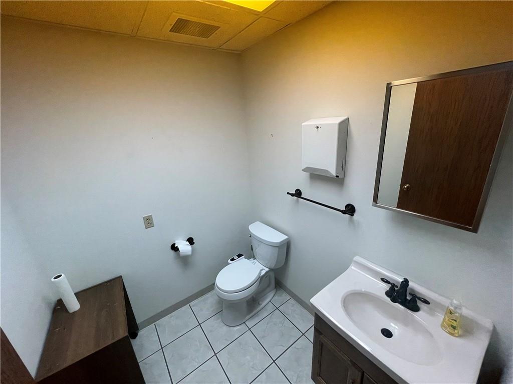 2616 Wilmington Road New Castle, PA 16105 - Photo 14 of 15 a bathroom with a sink and a toilet