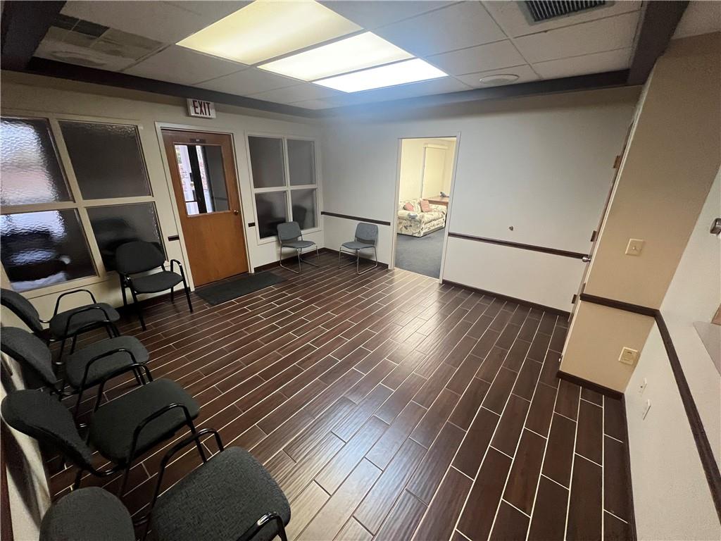 2616 Wilmington Road New Castle, PA 16105 - Photo 3 of 15 a view of a living room with wooden floor and furniture