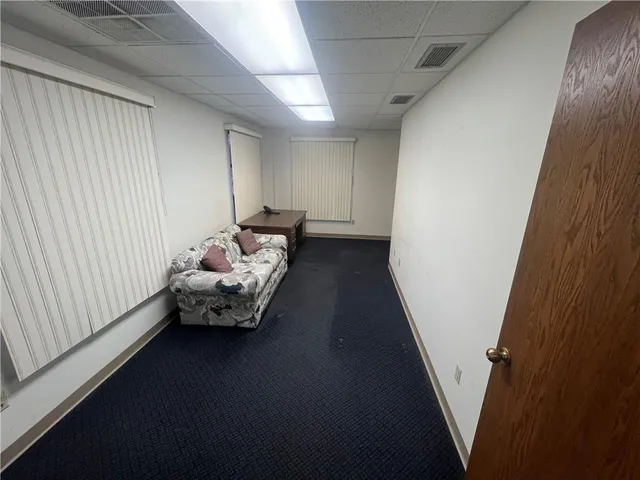 a room with furniture and a window