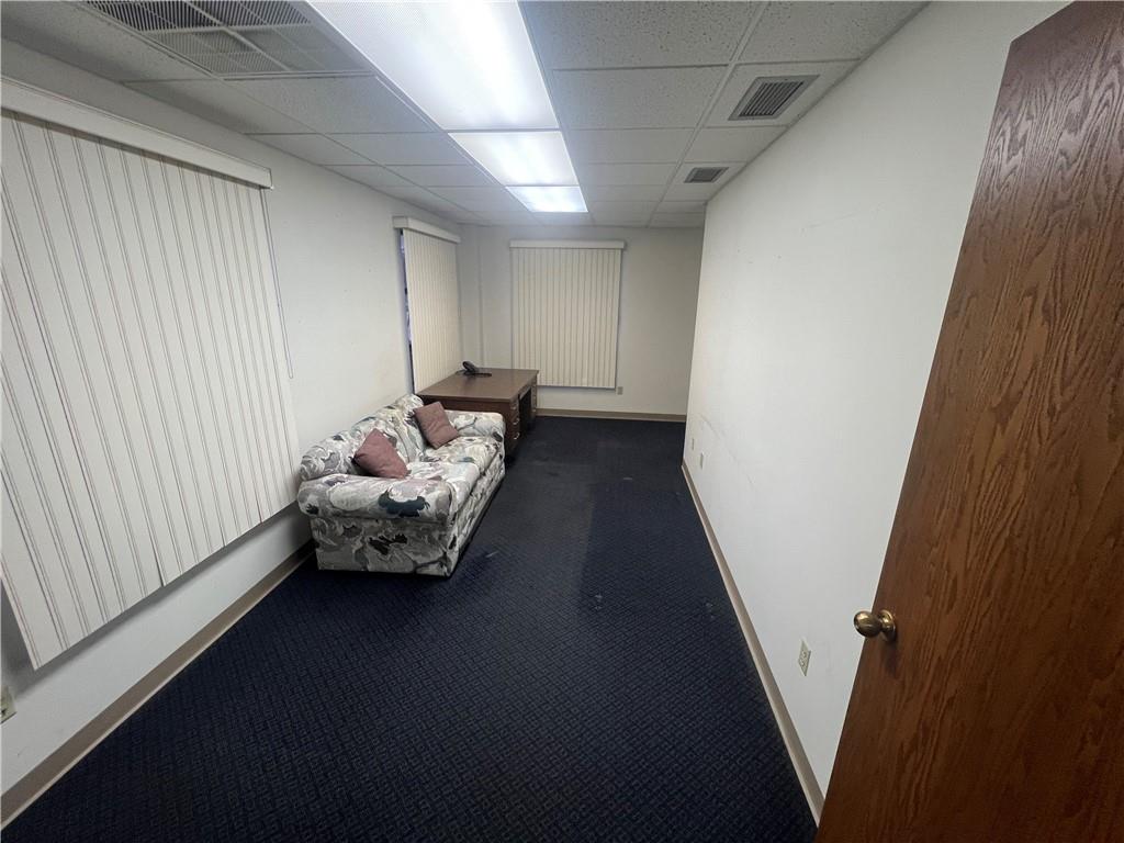 2616 Wilmington Road New Castle, PA 16105 - Photo 8 of 15 a room with furniture and a window