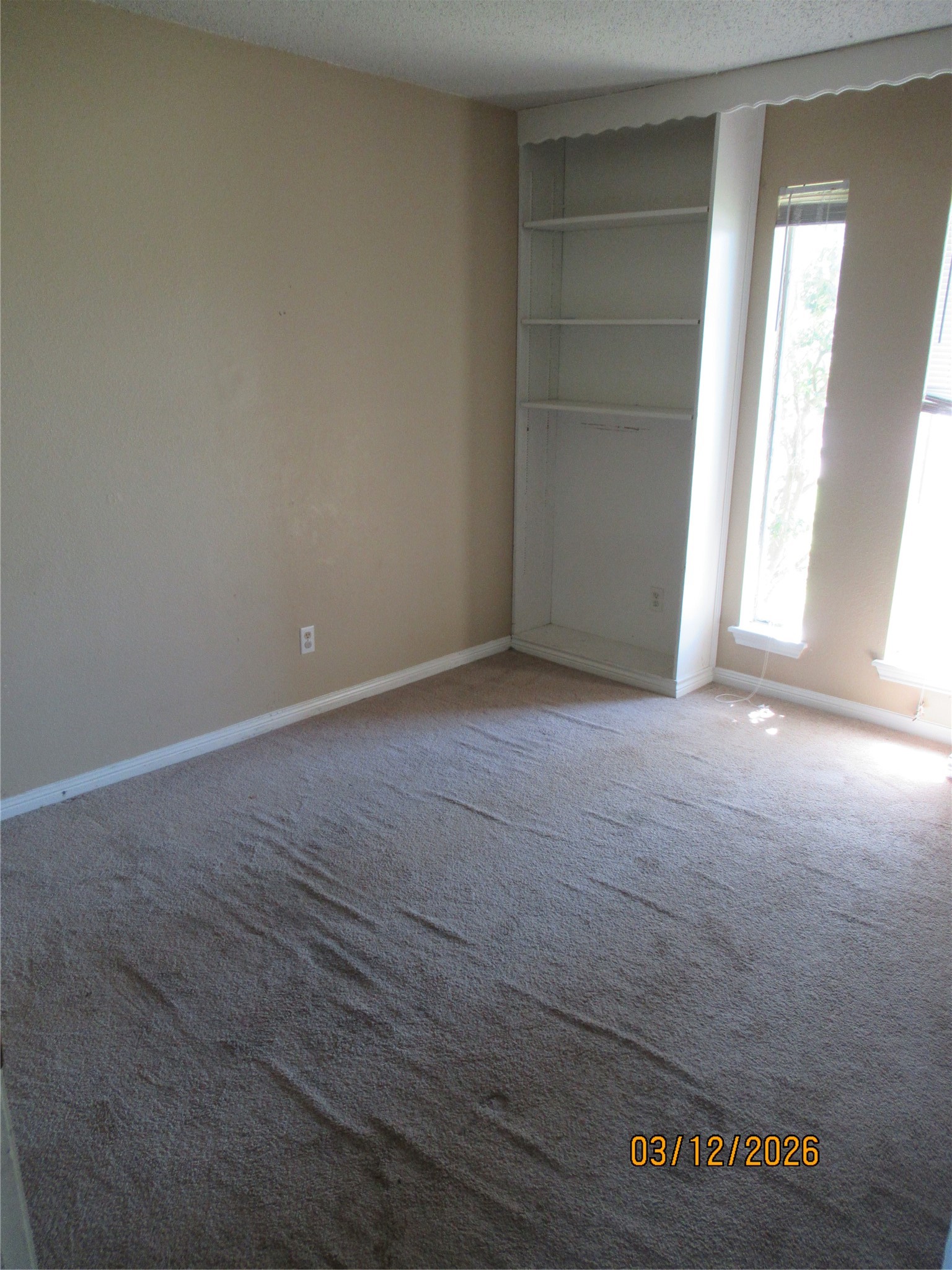 403 Lotus Street Lake Jackson, TX 77566 - Photo 20 of 29 an empty room with windows