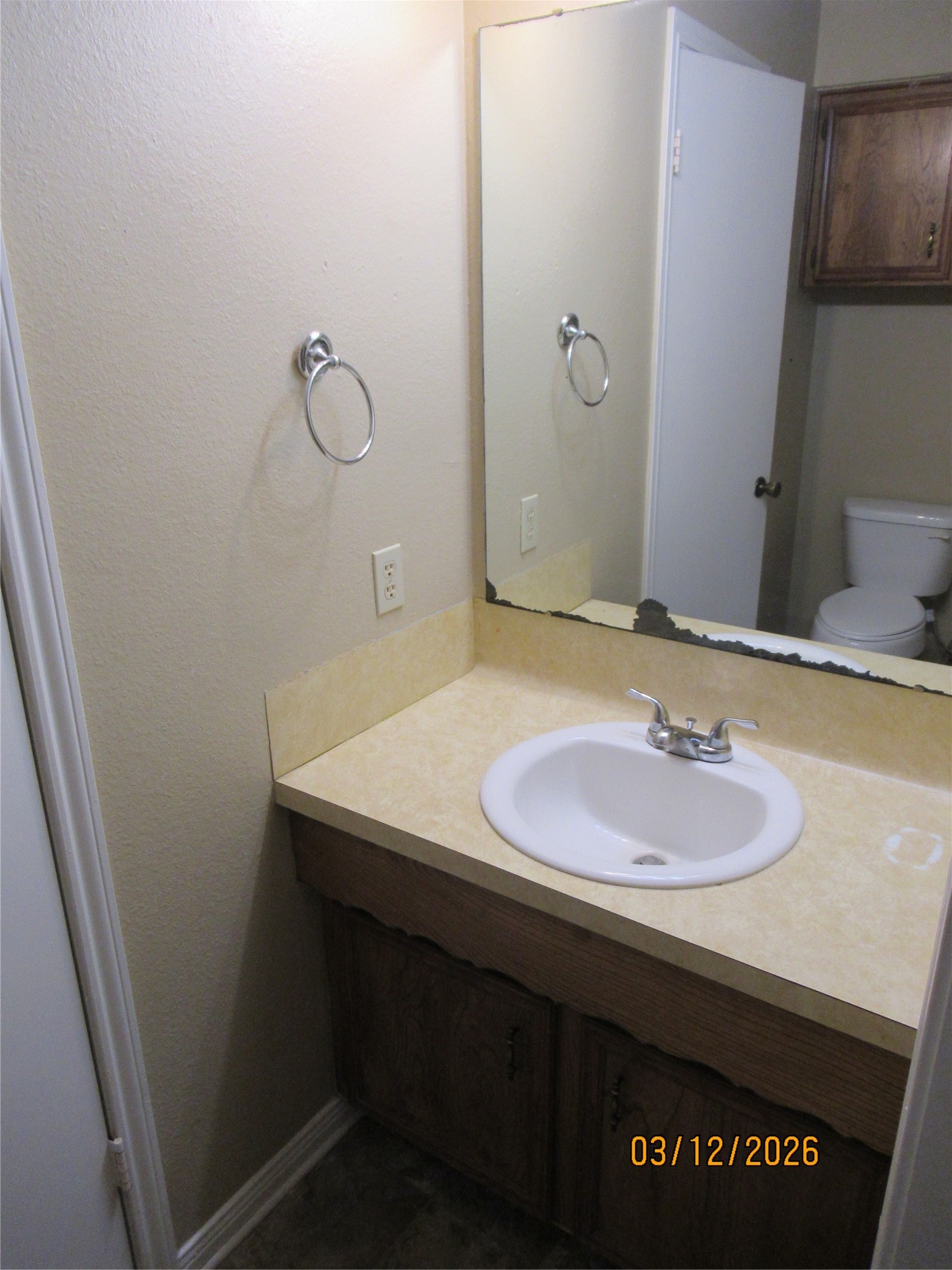 403 Lotus Street Lake Jackson, TX 77566 - Photo 24 of 29 a bathroom with a sink and a mirror