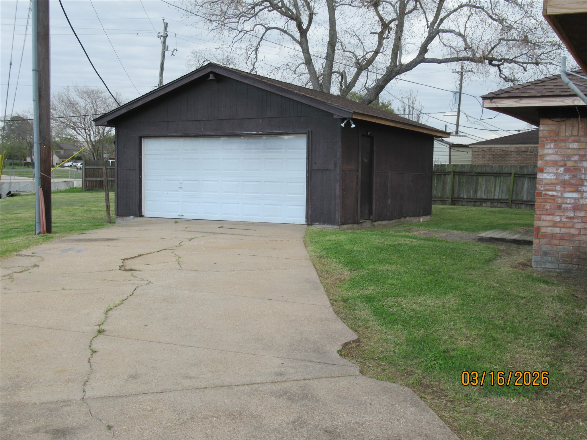 403 Lotus Street Lake Jackson, TX 77566 - Photo 8 of 29 a view of a house with a yard