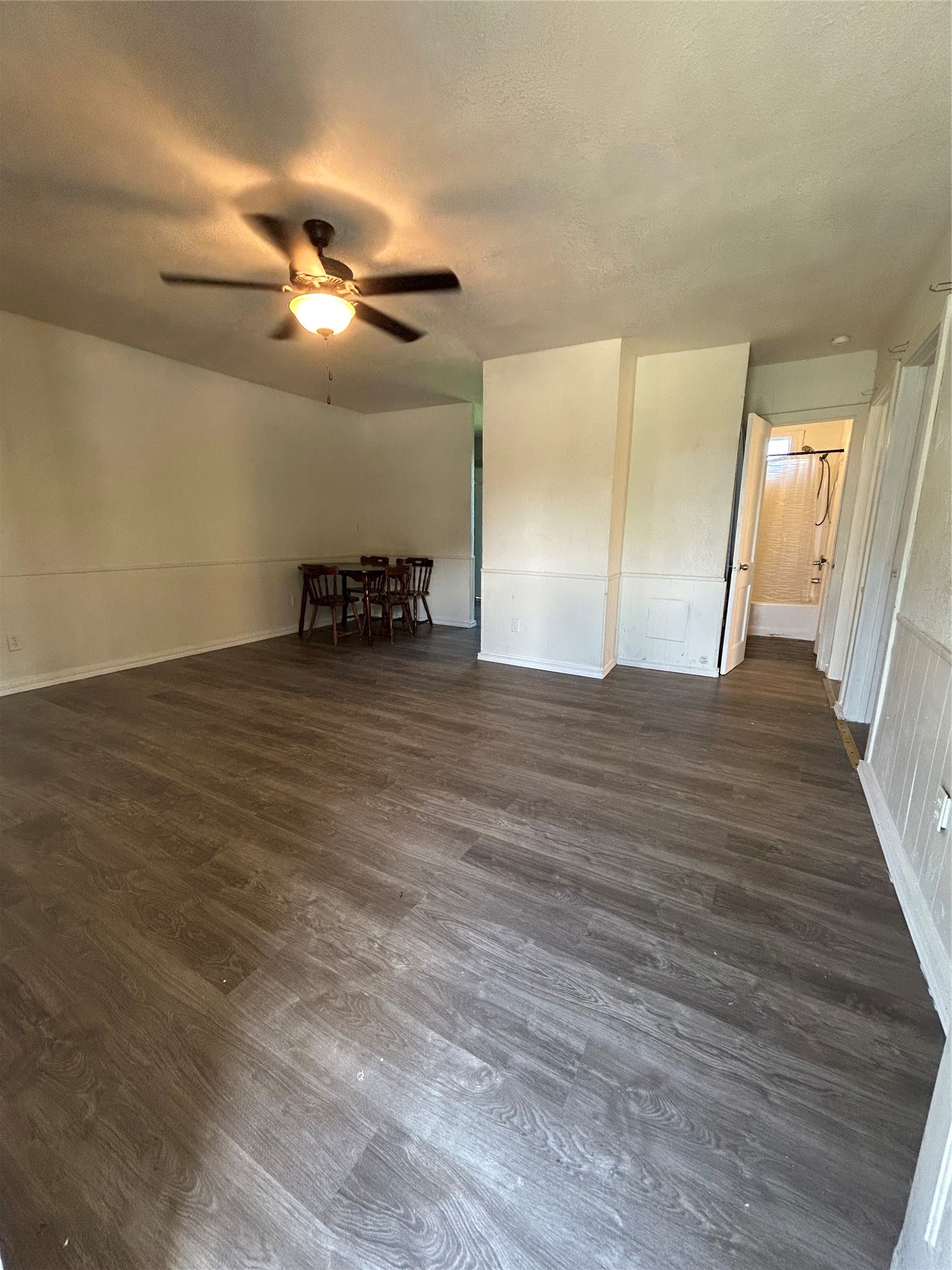 1102-11 West 10th Street Freeport, TX 77541 - Photo 4 of 10 a view of empty room with wooden floor