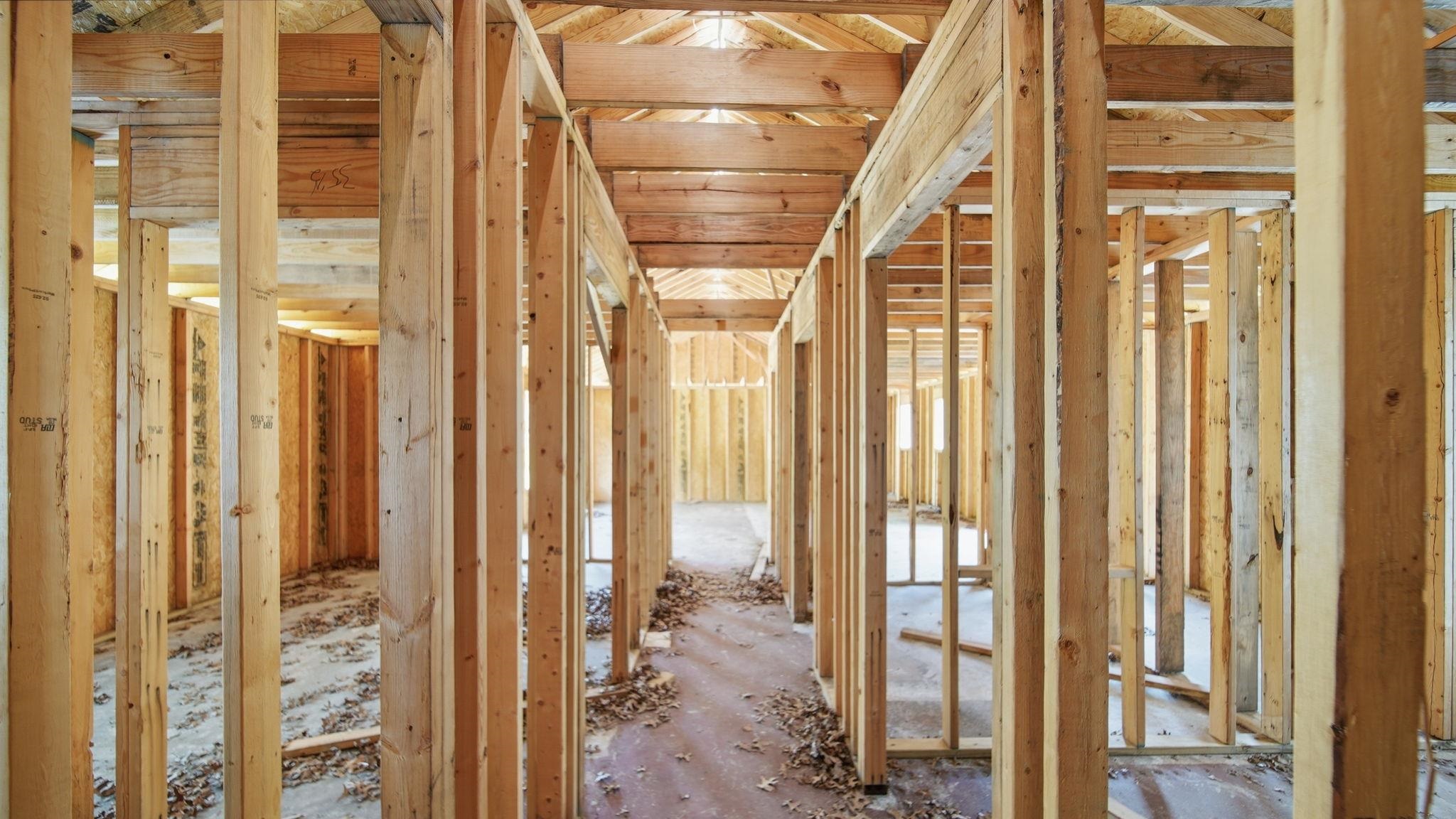 2278 Beaver Road Munford, TN 38058 - Photo 16 of 28 New construction framing showcasing structural wood studs, exposed ceiling joists, and subflooring