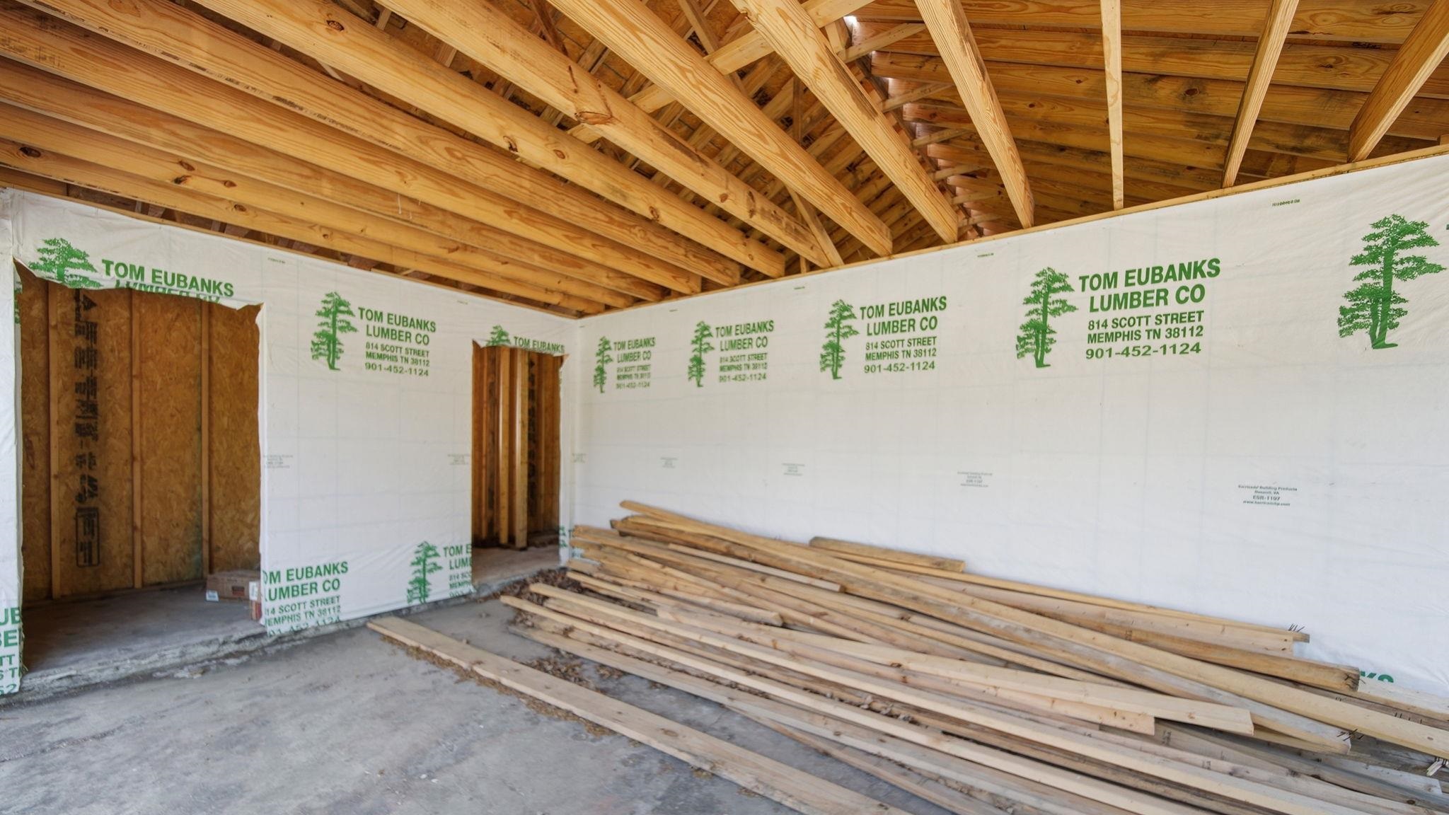 2278 Beaver Road Munford, TN 38058 - Photo 4 of 28 Exposed wooden ceiling trusses and wood wall framing