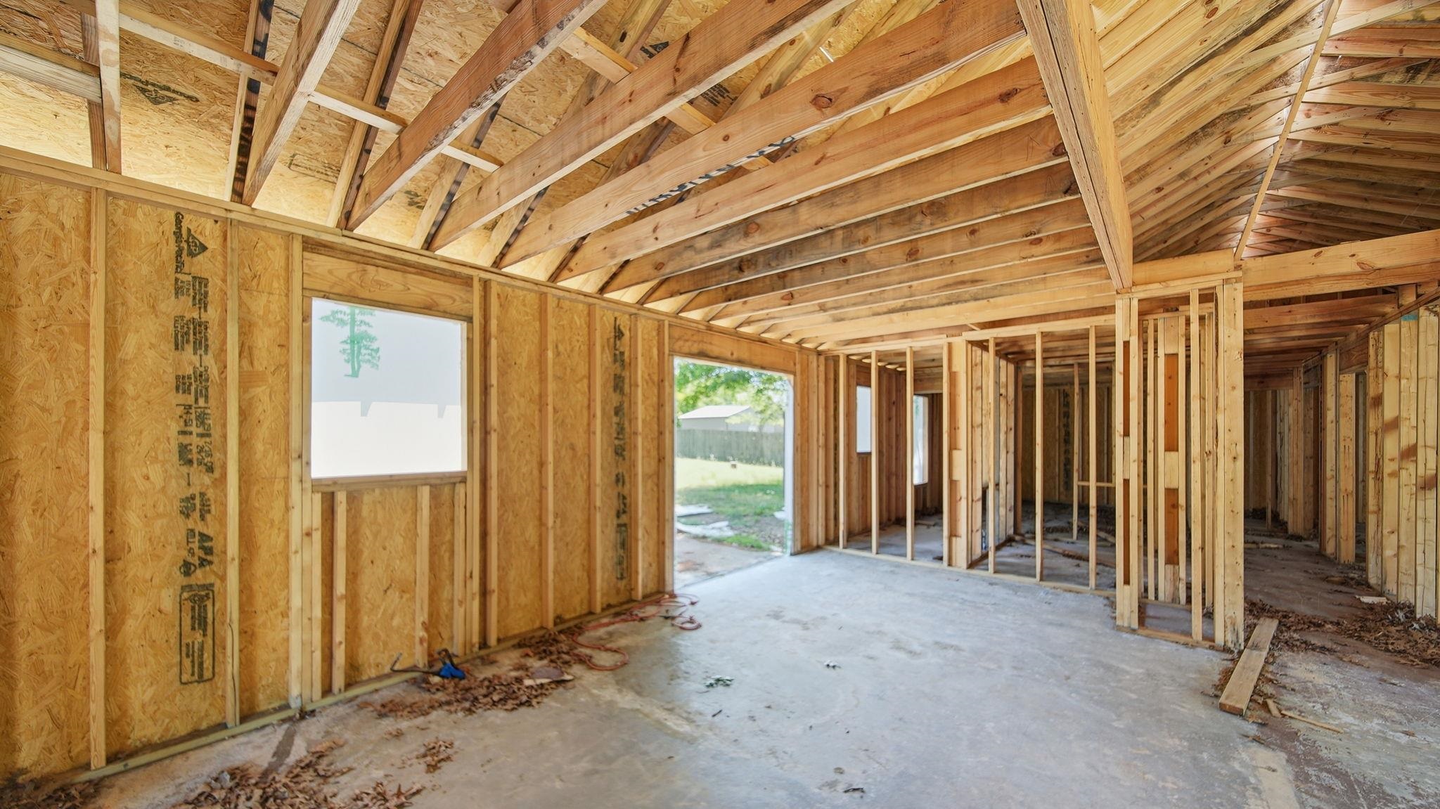 2278 Beaver Road Munford, TN 38058 - Photo 7 of 28 Interior framing and exposed rafters showcasing structural elements