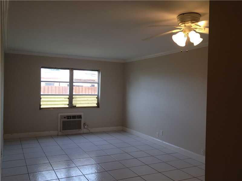 1480 East Sample Road, Unit 105B Pompano Beach, FL 33064 - Photo 2 of 2 Exterior Front