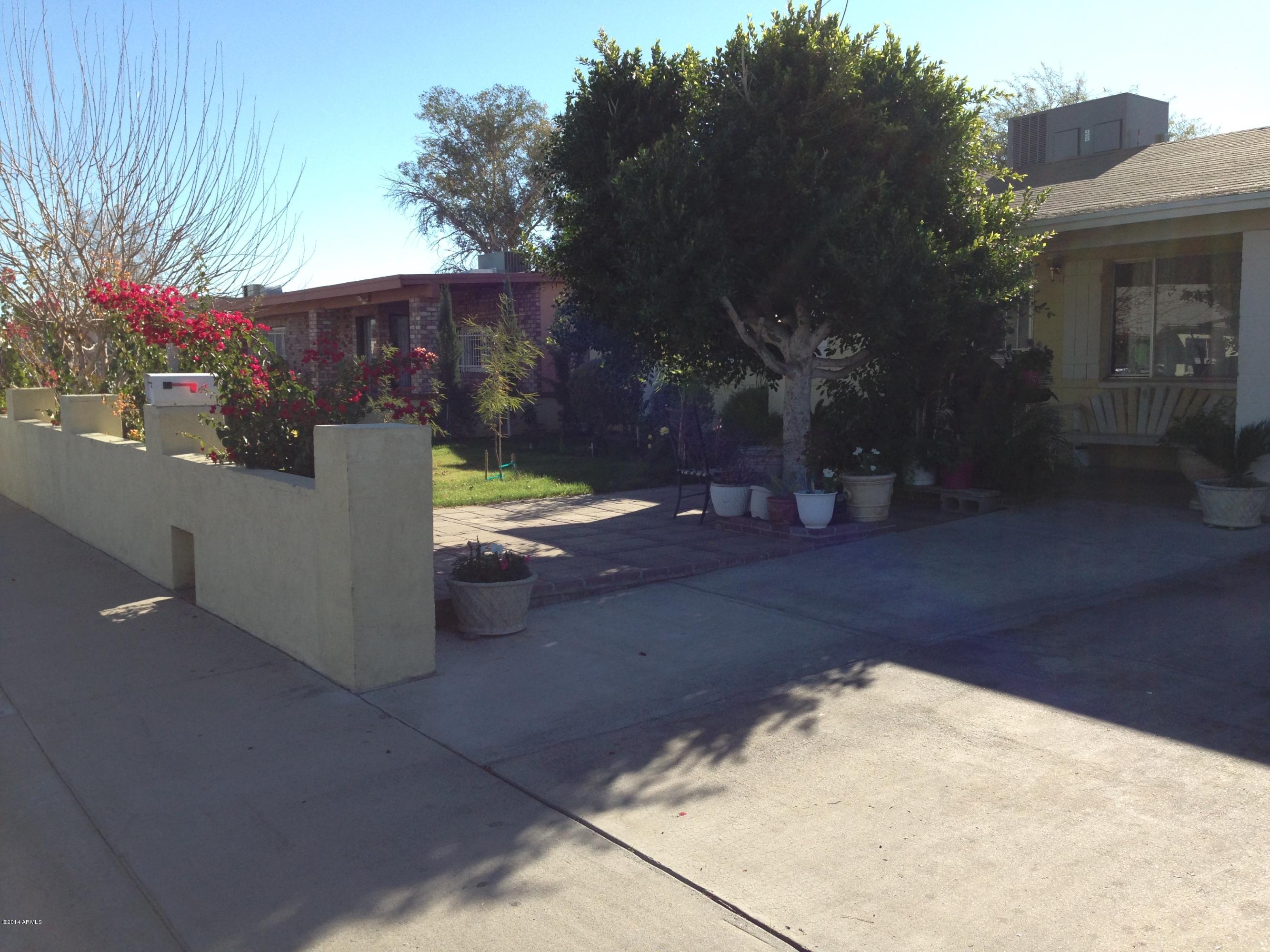 1737 West Carter Road Phoenix, AZ 85041 - Photo 3 of 15 IMG_1558