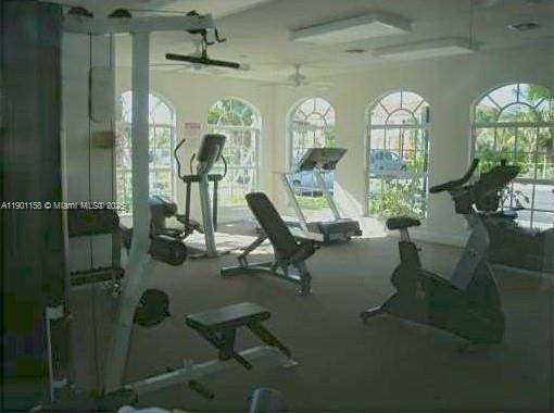 8740 Sherman Circle North, Unit 405 Miramar, FL 33025 - Photo 18 of 20 a view of a livingroom with furniture and windows