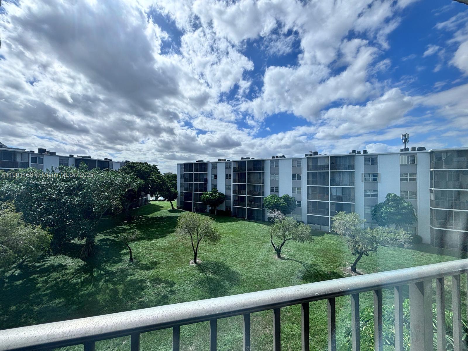 8740 Sherman Circle North, Unit 405 Miramar, FL 33025 - Photo 3 of 20 a view of a garden