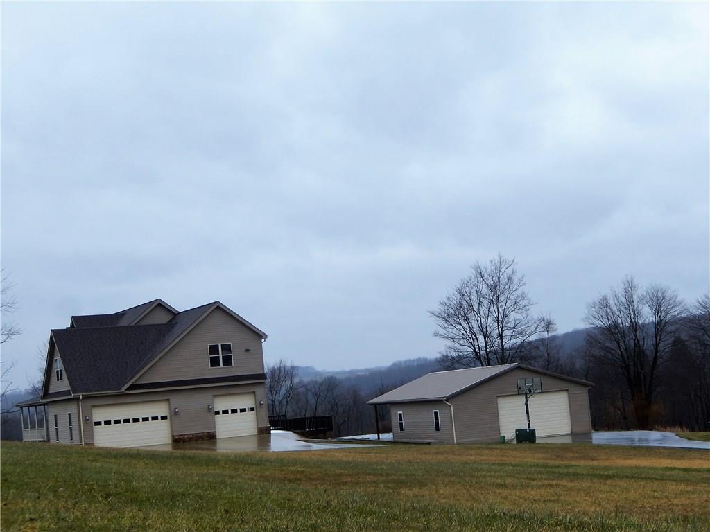 235 Simpson Road Greensburg, PA 15601 - Photo 2 of 21 3 car attached garage plus 4 car tandem garage.