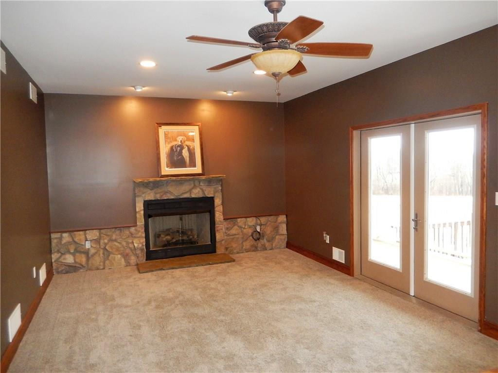 235 Simpson Road Greensburg, PA 15601 - Photo 5 of 21 Cozy up next to this stone wood burning firerplace