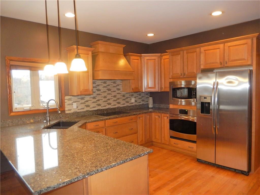235 Simpson Road Greensburg, PA 15601 - Photo 6 of 21 This modern kitchen is fully equipped with stainless appliances and large pantry.