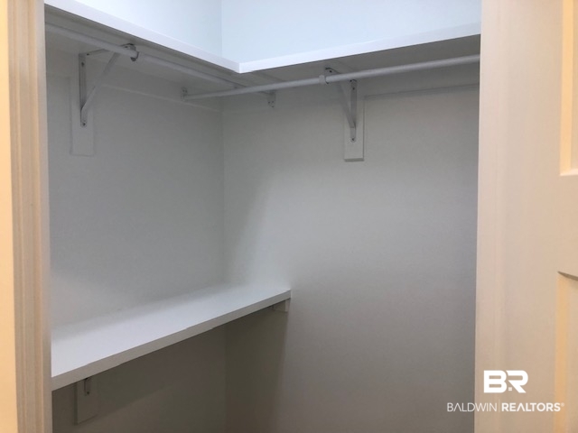 224 Divot Loop Fairhope, AL 36532 - Photo 16 of 36 His/Her's Master closets