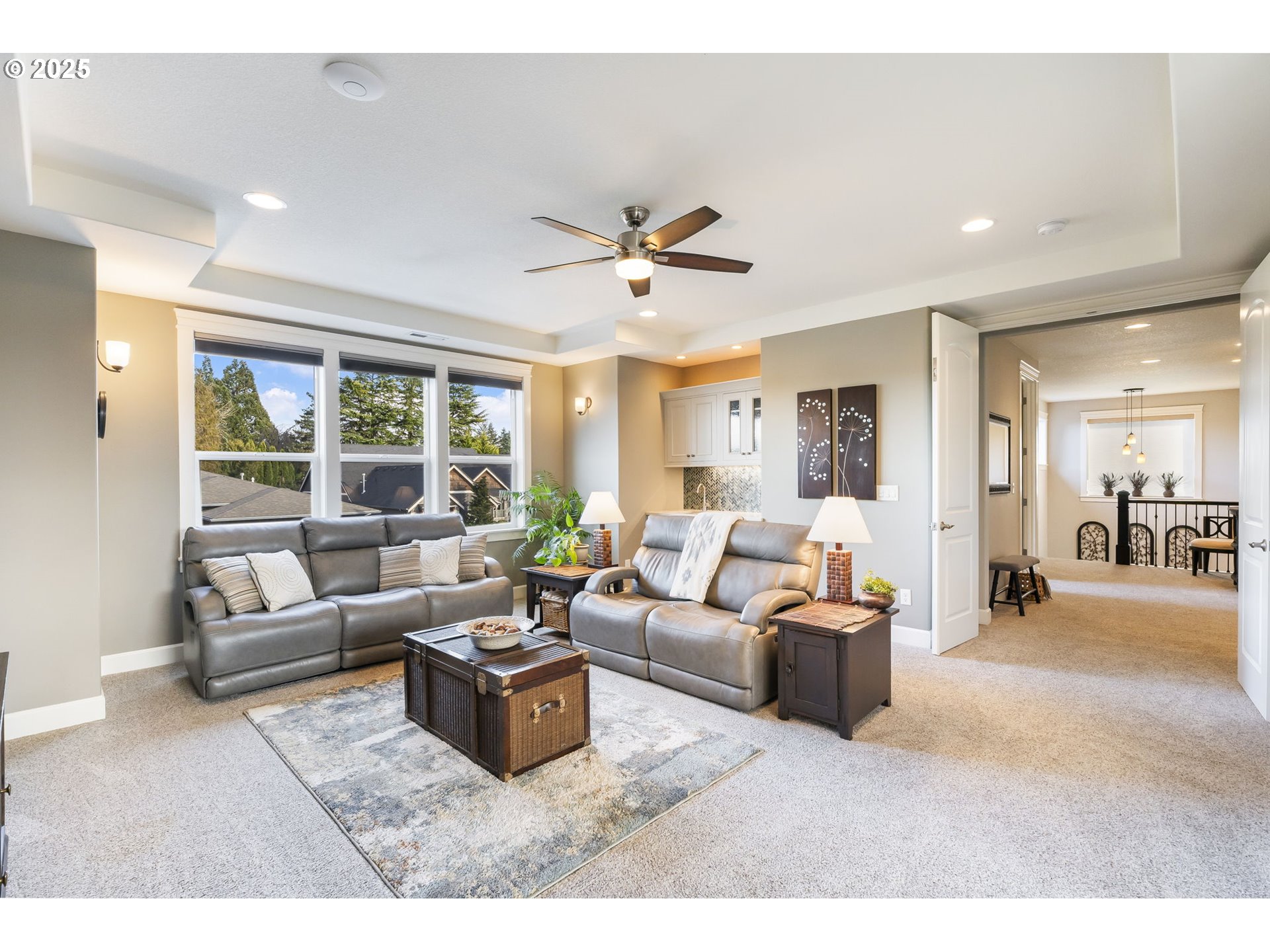 17612 Northeast 26th Avenue Ridgefield, WA 98642 - Photo 29 of 47 a living room with furniture and a large window with outer view