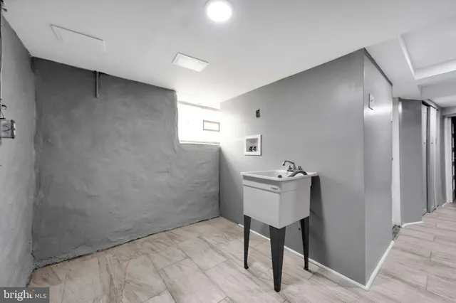 a view of a house with a yard and stairs