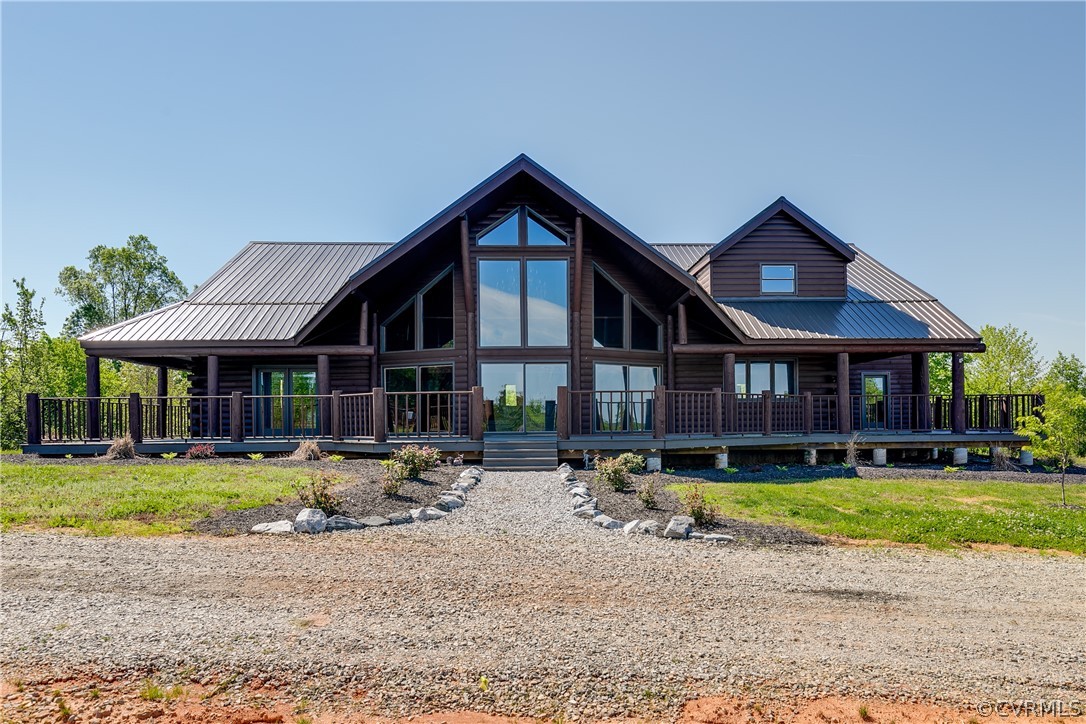 1471 New Bethel Road Meherrin, VA 23954 - Photo 2 of 50 a front view of a house with garden