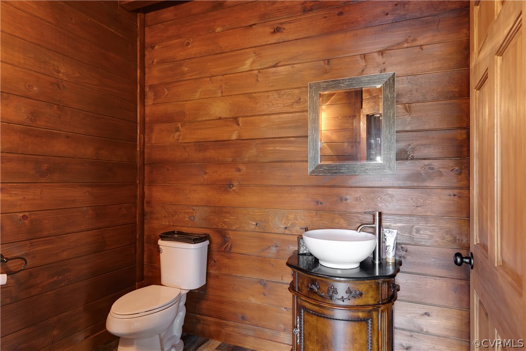 1471 New Bethel Road Meherrin, VA 23954 - Photo 21 of 50 a bathroom with a toilet and a mirror