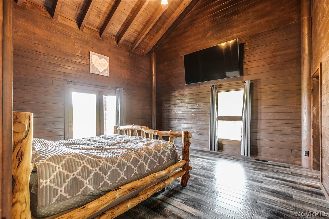 1471 New Bethel Road Meherrin, VA 23954 - Photo 22 of 50 a bedroom with a bed and a flat screen tv