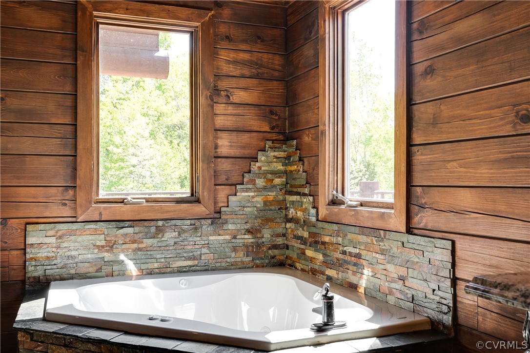 1471 New Bethel Road Meherrin, VA 23954 - Photo 29 of 50 a bathroom with a bathtub and window