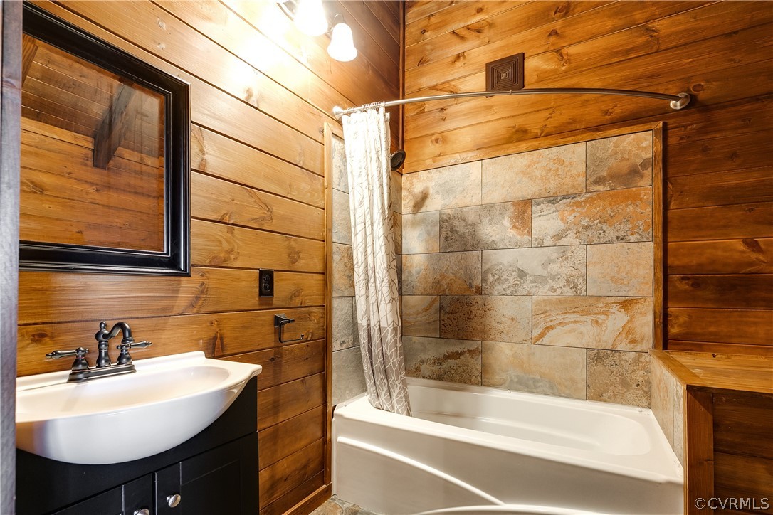 1471 New Bethel Road Meherrin, VA 23954 - Photo 40 of 50 a bathroom with a sink shower and a bathtub