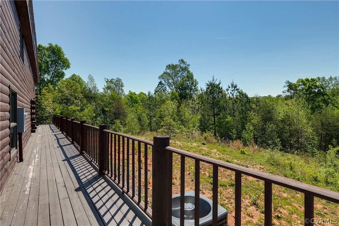 1471 New Bethel Road Meherrin, VA 23954 - Photo 44 of 50 a balcony with wooden floor and fence