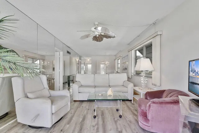 a view of a kitchen and dining room