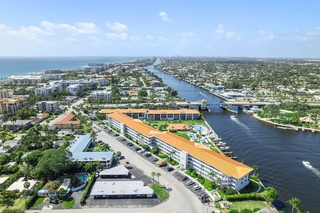 an aerial view of residential building and lake view