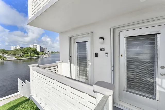 a house view with a lake view