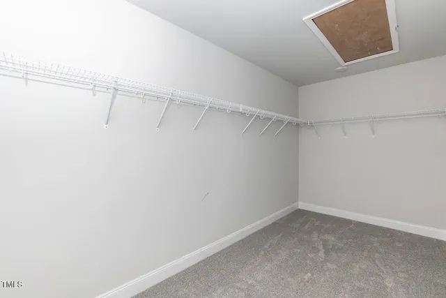 a view of a room with racks on the wall