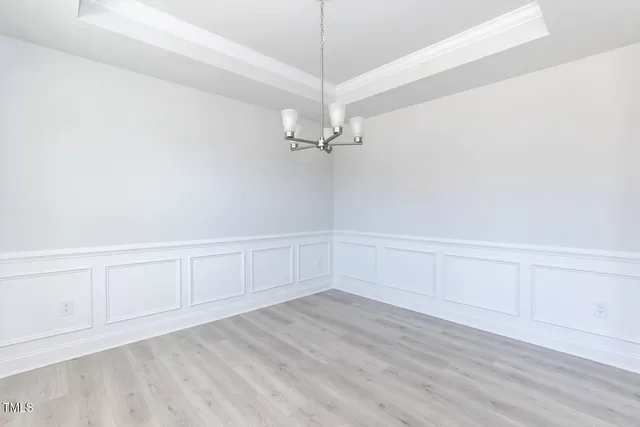 a view of a room with hardwood floor