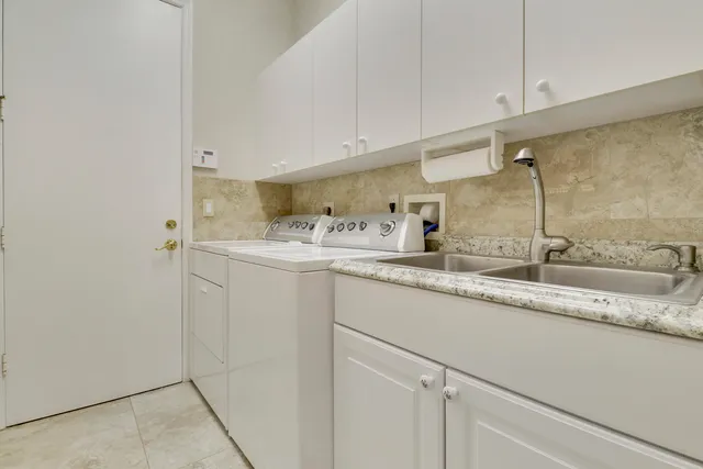 a view of a backyard with a garden and trees