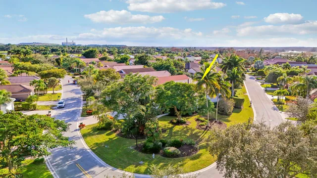 a view of a backyard of the house