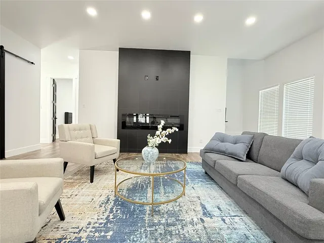 a living room with furniture and a couch