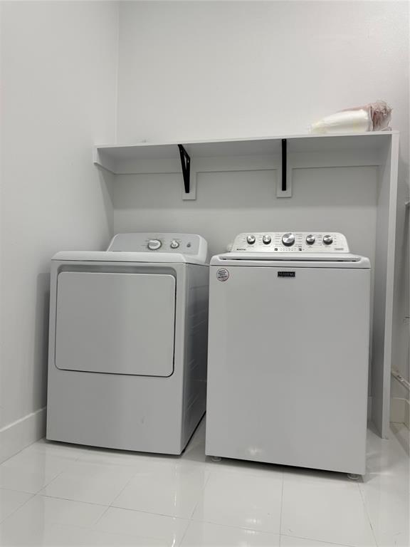 4602 Sycamore Street Dallas, TX 75204 - Photo 20 of 24 a utility room with dryer and washer