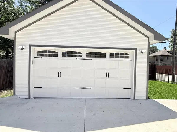 a view of a house with garage