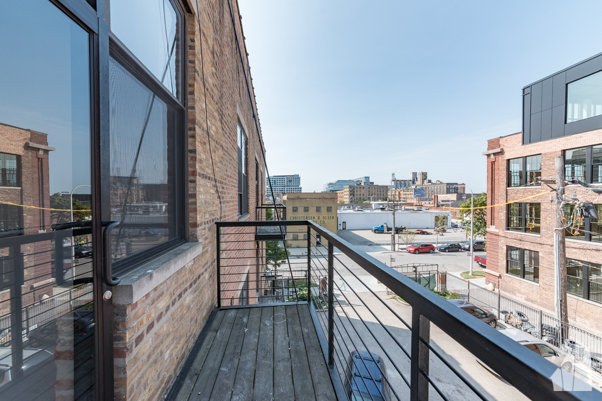 213 North Racine Avenue, Unit 305 Chicago, IL 60607 - Photo 22 of 22 a view of balcony with a couple of potted plants