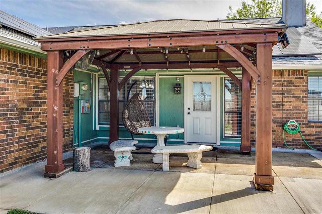 1104 Collin Drive Allen, TX 75002 - Photo 22 of 25 Custom patio cover! Solar Panels convey and are fully owned!