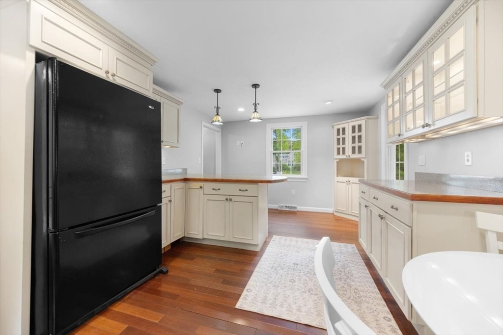 48 Knollwood Road Norwell, MA 02061 - Photo 11 of 41 a large kitchen with a refrigerator a sink dishwasher and a stove