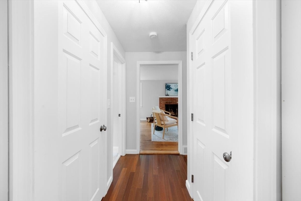 48 Knollwood Road Norwell, MA 02061 - Photo 14 of 41 a view of a hallway with wooden floor and a bathroom