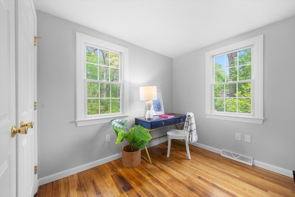 48 Knollwood Road Norwell, MA 02061 - Photo 16 of 41 a dining room with a table and chairs