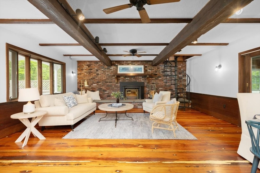48 Knollwood Road Norwell, MA 02061 - Photo 3 of 41 a living room with fireplace furniture and a large window