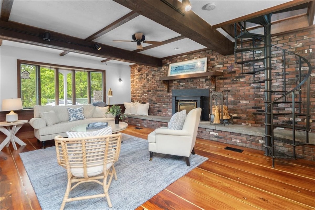 48 Knollwood Road Norwell, MA 02061 - Photo 5 of 41 a living room with fireplace furniture and a large window